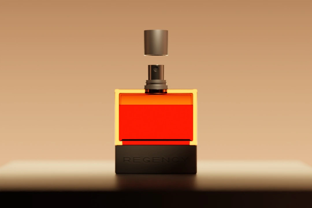 Red perfume bottle with a dark base, gold spray mechanism and floating metallic cap.